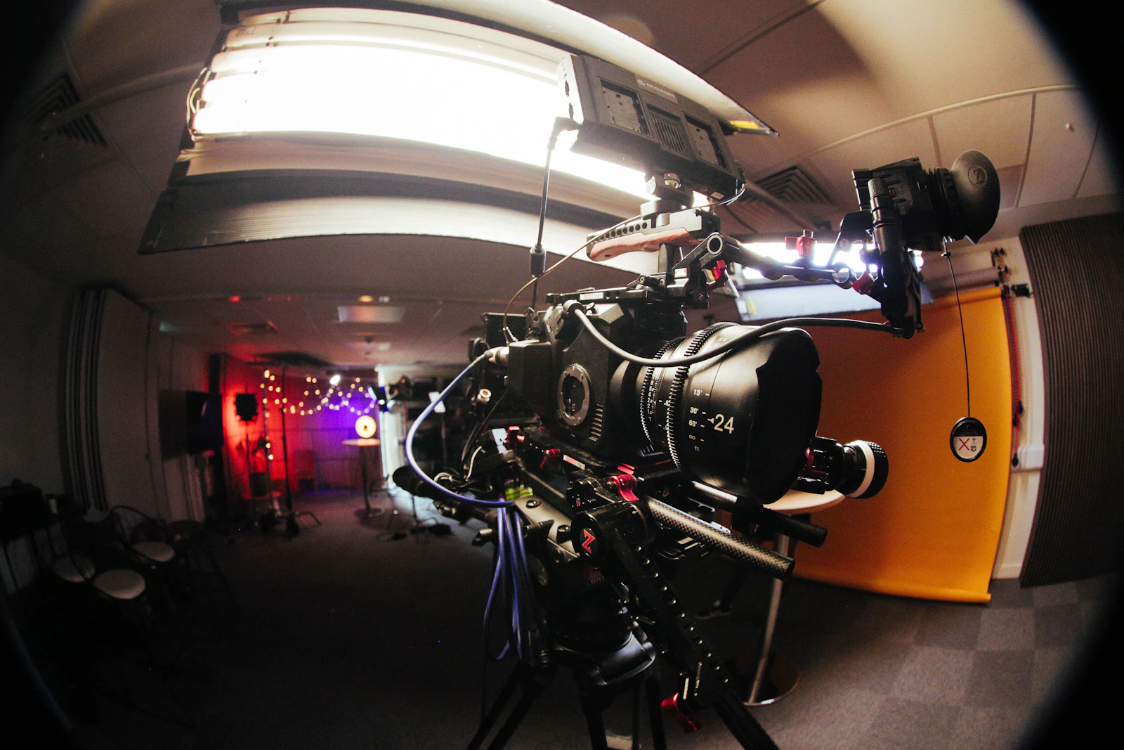 Cinema camera rig and studio lights positioned for a live-action shoot.