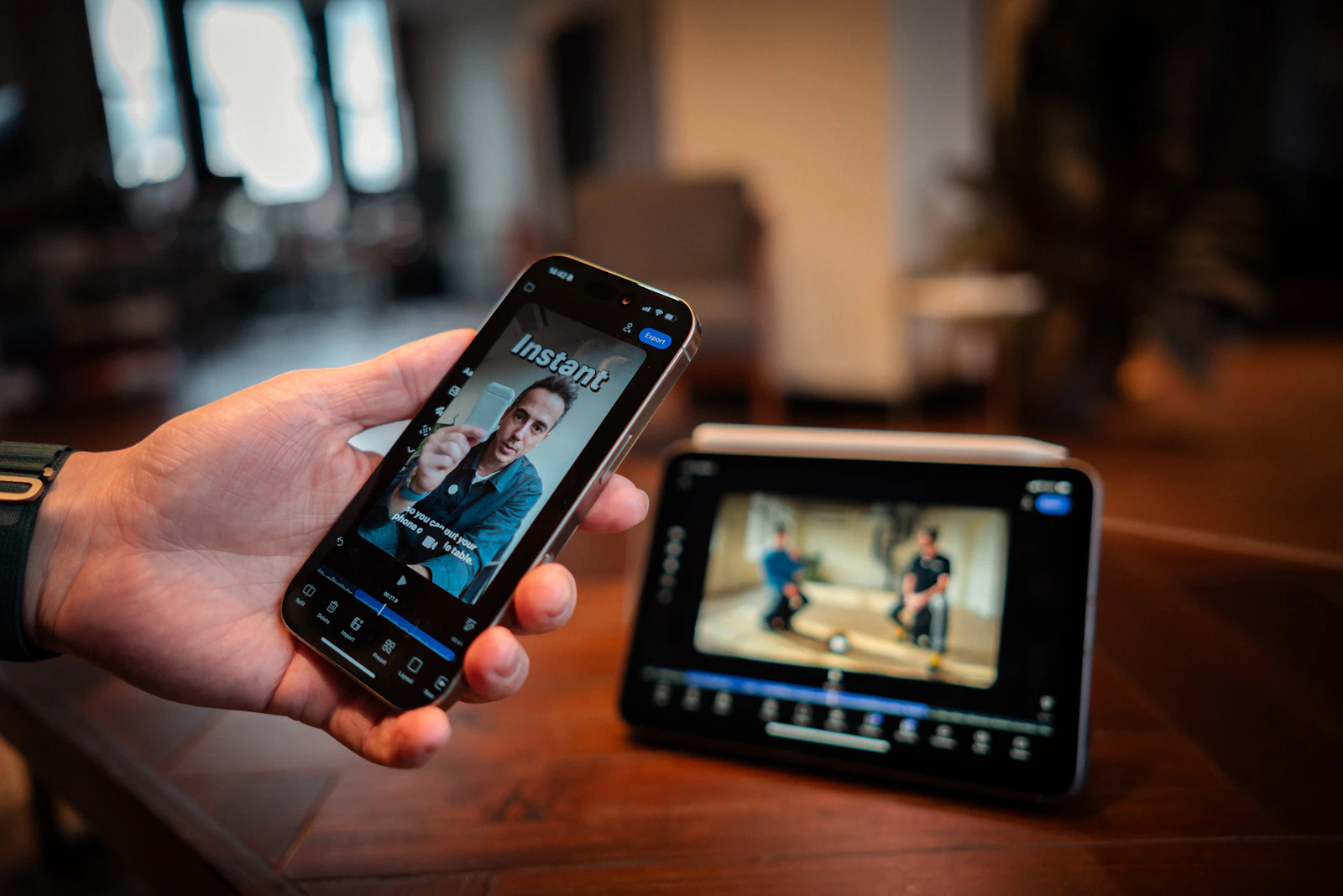 A phone showing a portrait video beside a tablet showing a wider frame.
