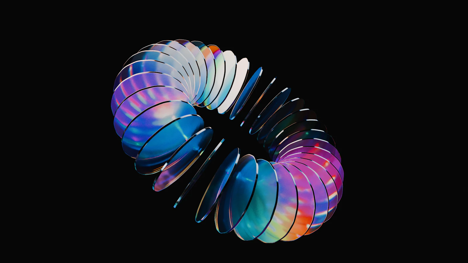 Circular 3D form built from a repeating sequence of translucent coloured discs.